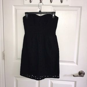 Strapless black dress.